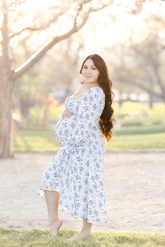 A pregnant woman posing for a photoshoot